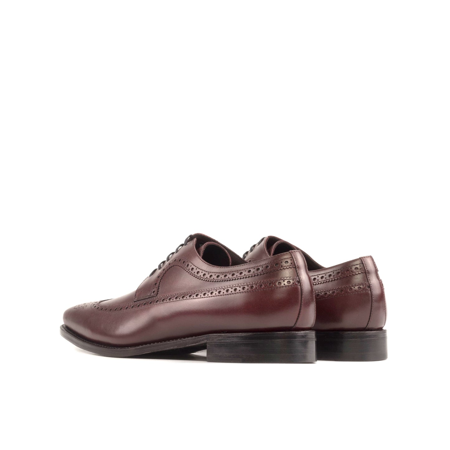 Long Wingtip Derby in Burgundy Box Calf, rear three-quarter view