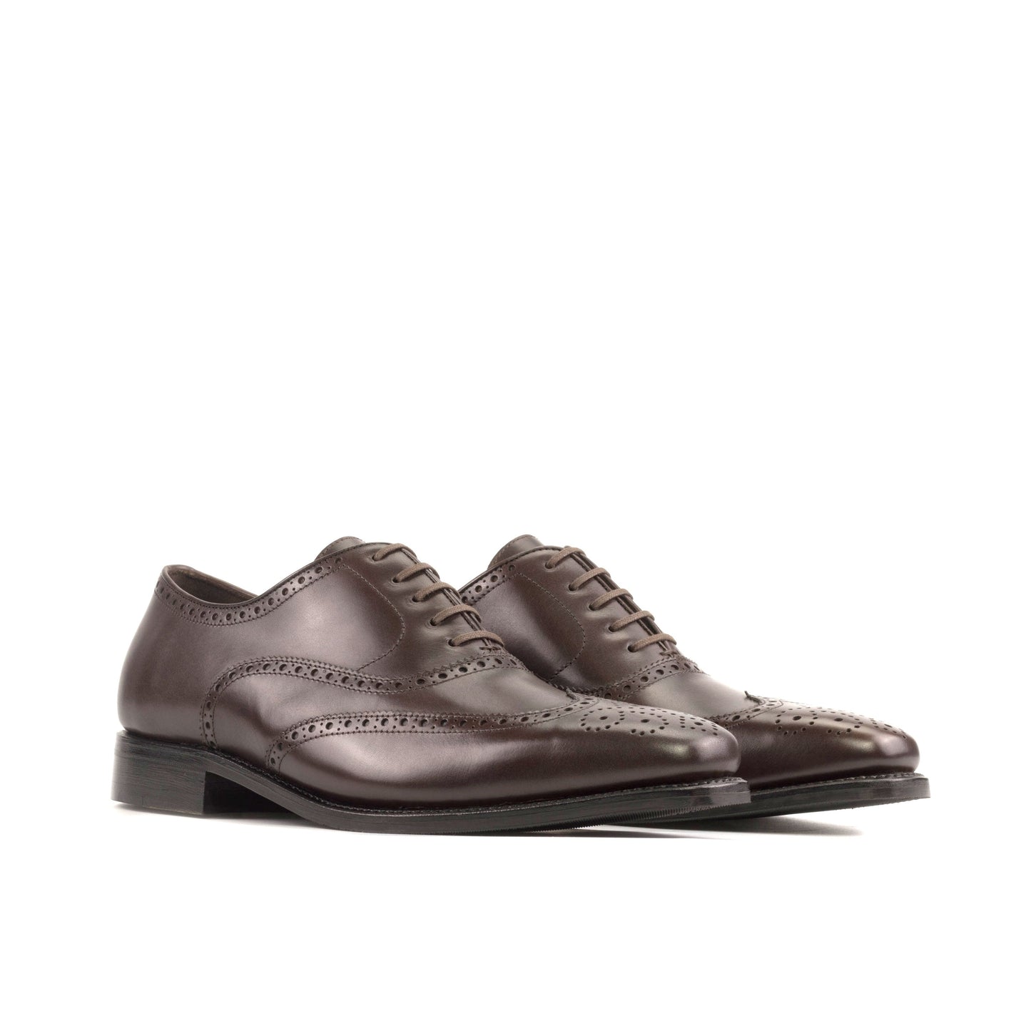 Wingtip Oxford in Dark Brown Box Calf, front three-quarter view