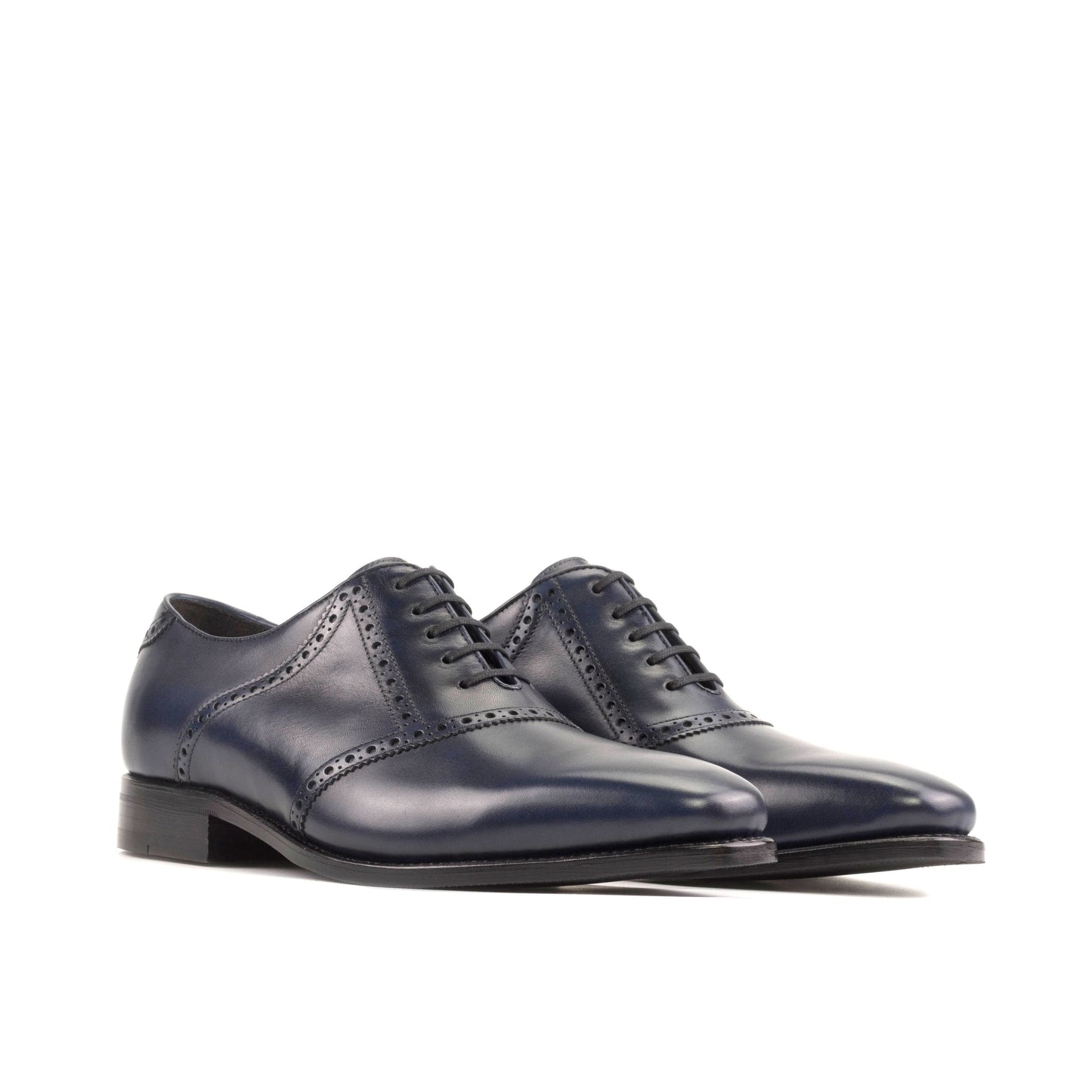 Saddle Shoe in Navy Box Calf, front three-quarter view