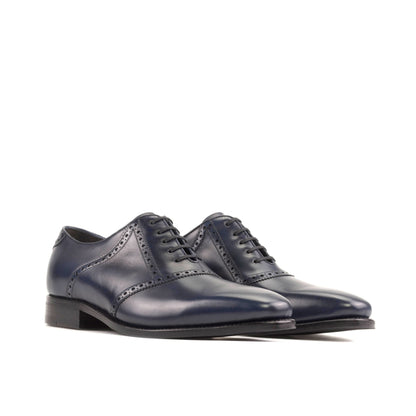 Saddle Shoe in Navy Box Calf, front three-quarter view
