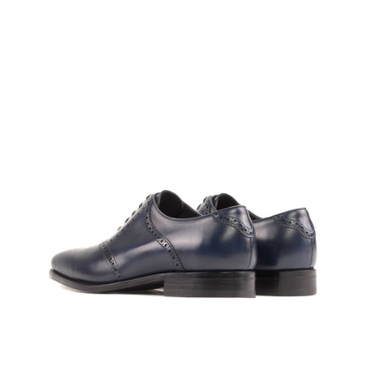 Saddle Shoe in Navy Box Calf, rear three-quarter view