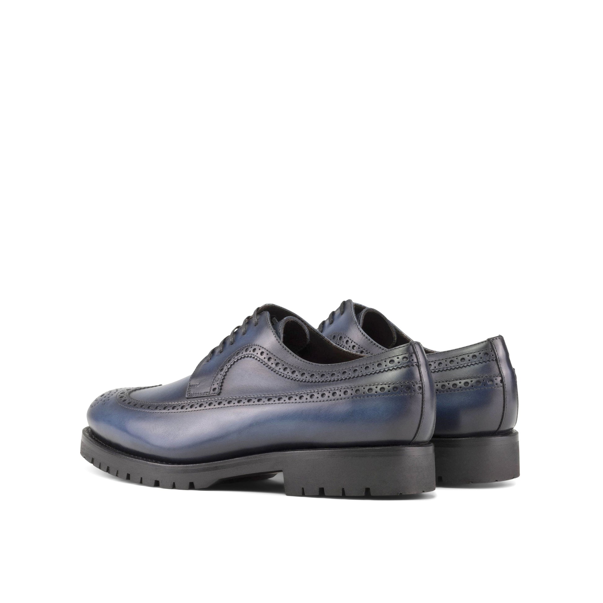 Long Wingtip Derby in Navy Painted Box Calf, rear three-quarter view