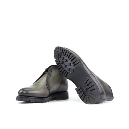 Burnished Grey Painted Box Calf Chukka boots showing black commando rubber sole