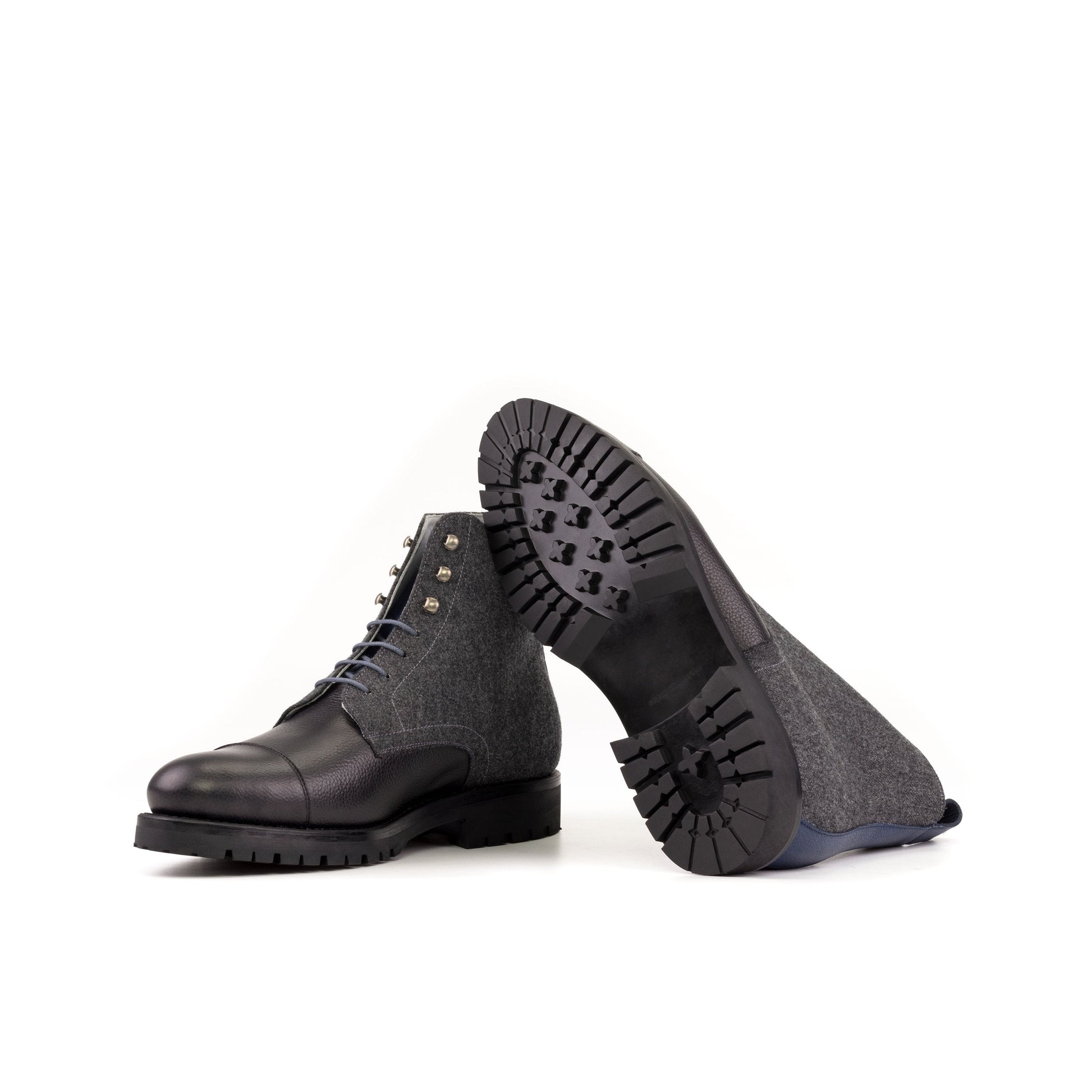 Jumper Boot in Dark Grey Flannel and Black Painted Full-Grain Box Calf showing black commando rubber sole