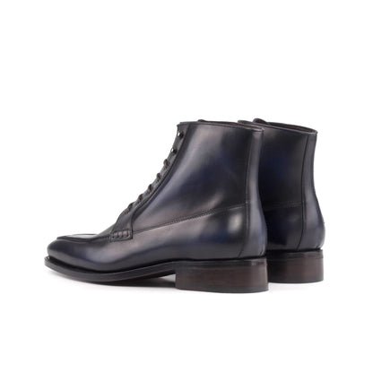 Moc Toe Boot in Burnished Navy Box Calf, rear three-quarter view