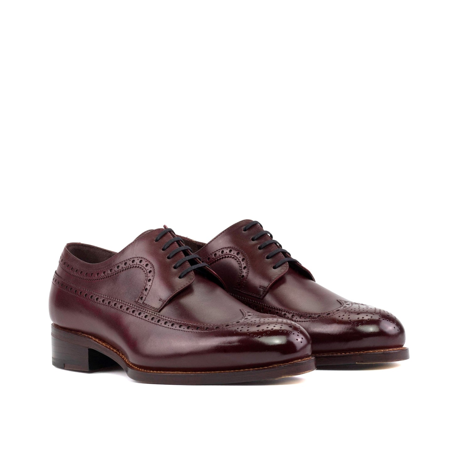 Long Wingtip Derby in Burgundy Box Calf, front three-quarter view