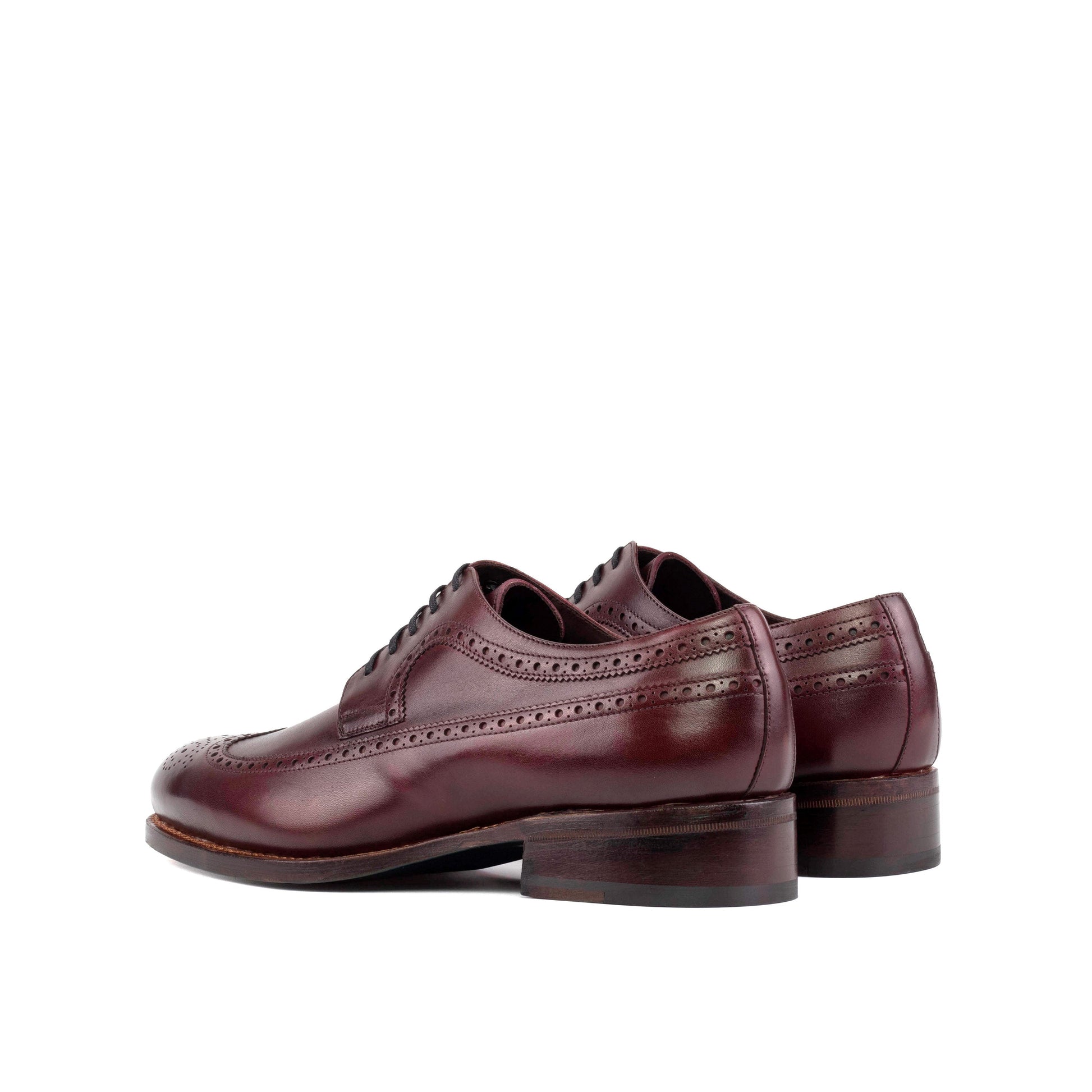 Long Wingtip Derby in Burgundy Box Calf, rear three-quarter view