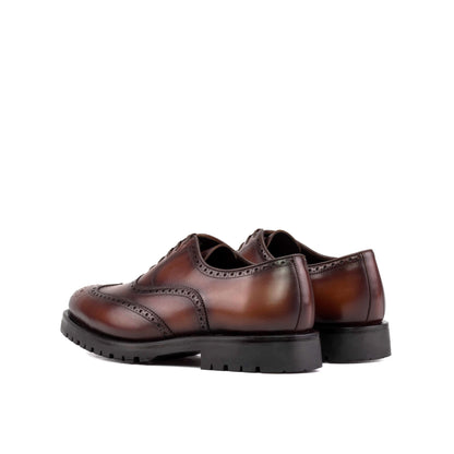 Wingtip Oxford in Burnished Dark Brown Box Calf, rear three-quarter view