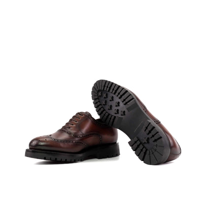 Wingtip Oxford in Burnished Dark Brown Box Calf showing black commando rubber sole