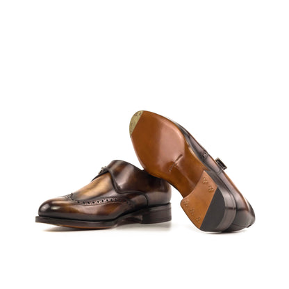 Single Monk Strap in Fire Museum Patina Box Calf showing cognac leather sole with a bevelled waist