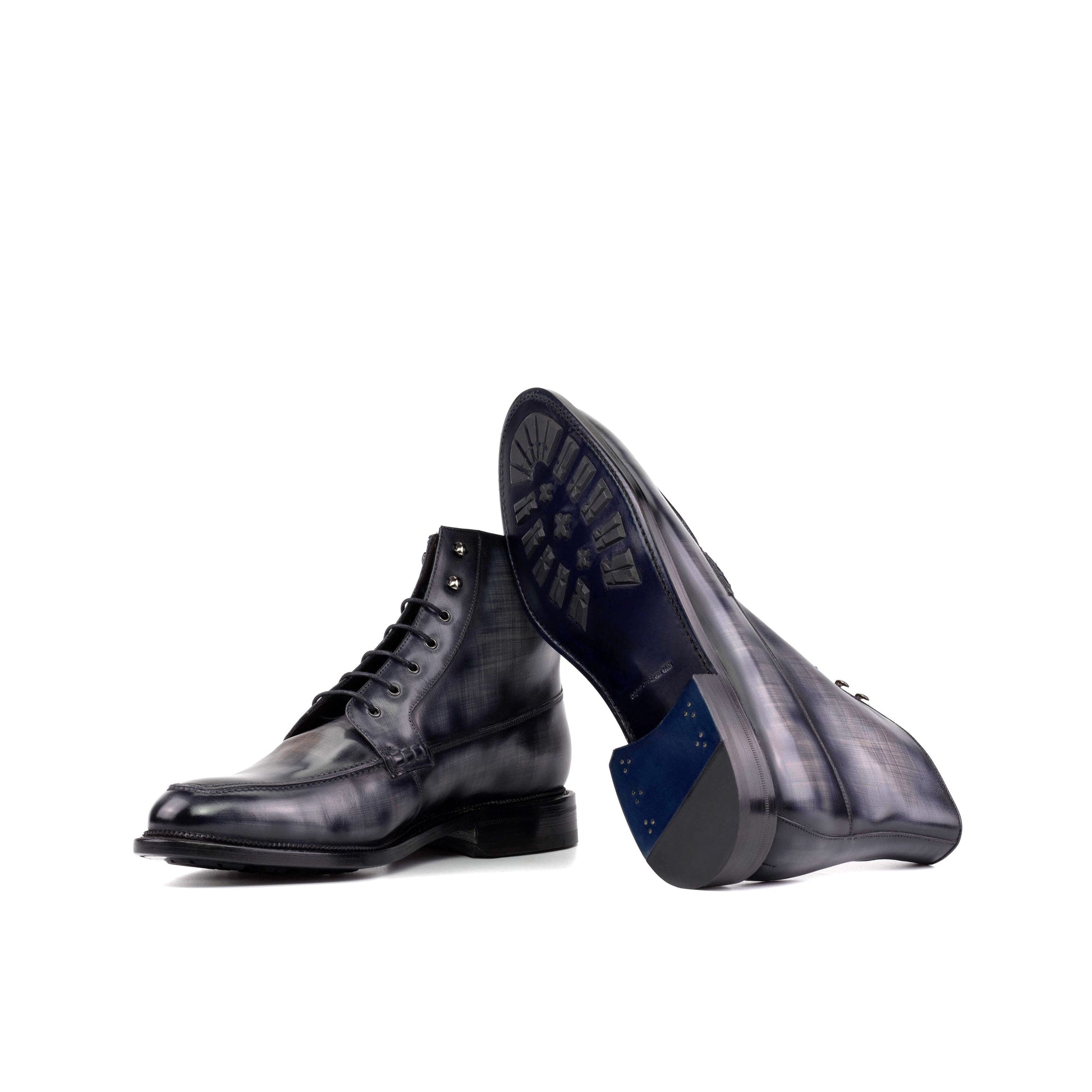 Moc Toe Boot in Grey Patina Box Calf showing ultramar leather sole with mountain rubber injections