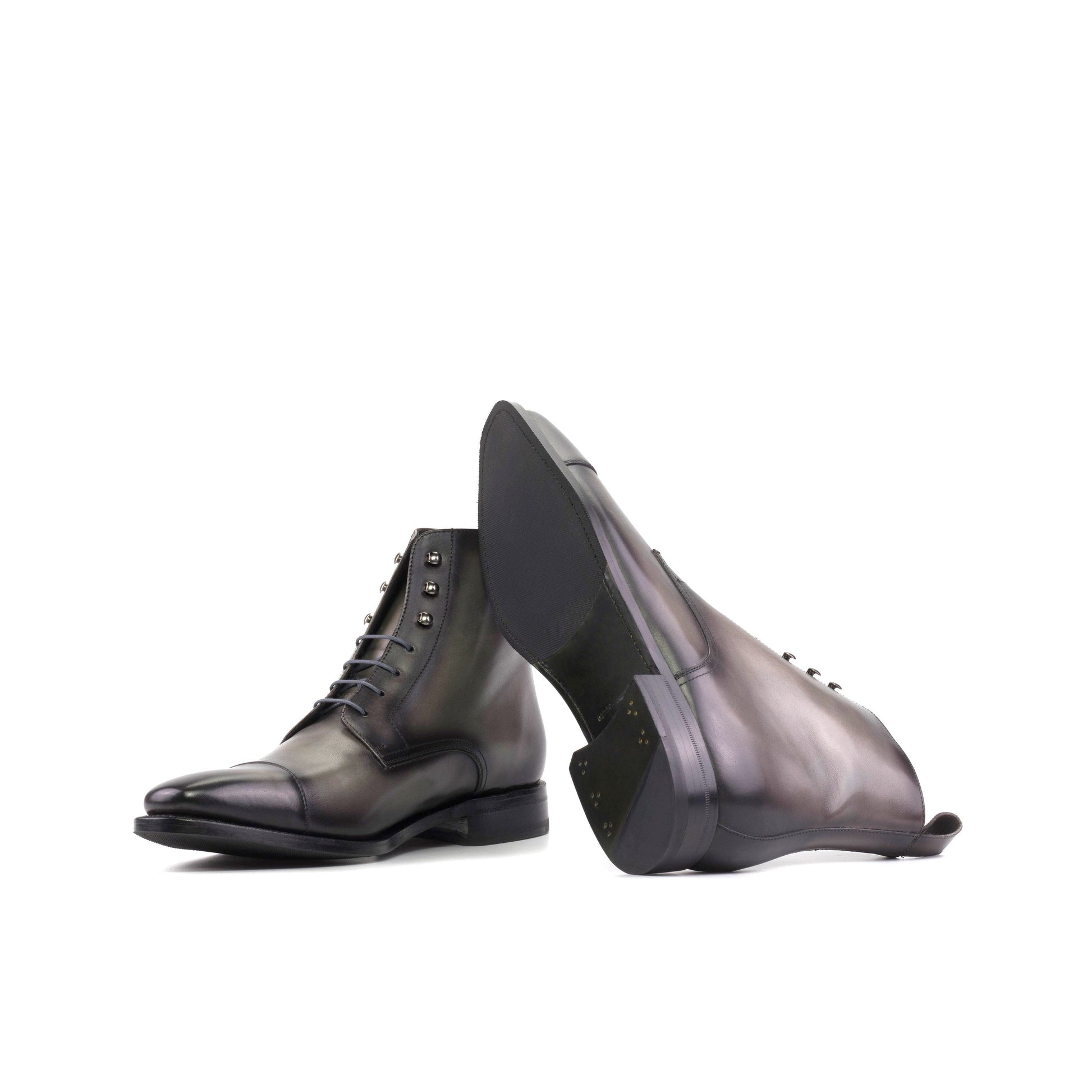Jumper Boot in Grey Painted Box Calf showing forest green leather and rubber combination sole