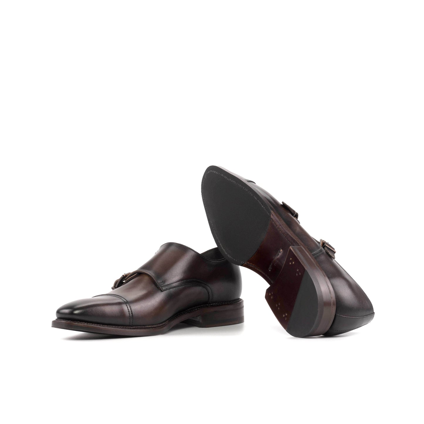 Double Monk Strap in Dark Brown Painted Box Calf showing brown leather and rubber combination sole