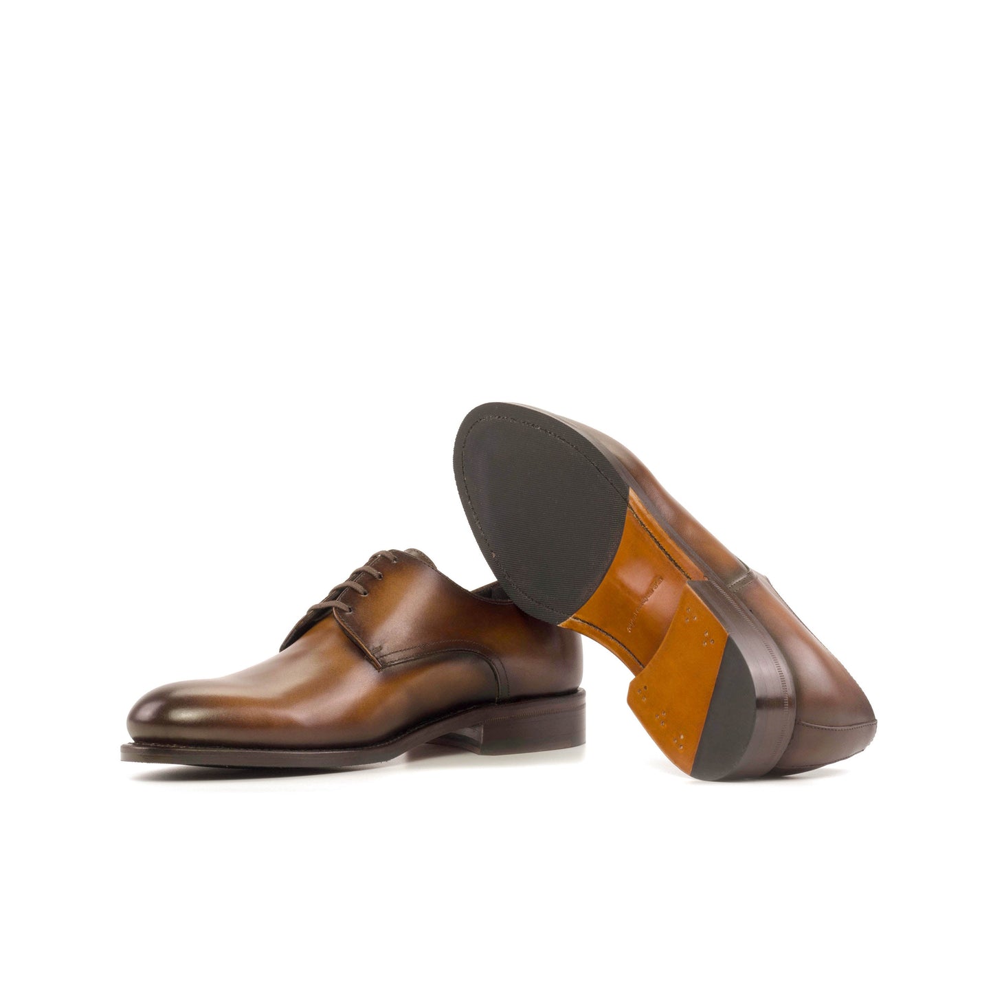Derby in Medium Brown Painted Box Calf showing cognac leather and rubber combination sole
