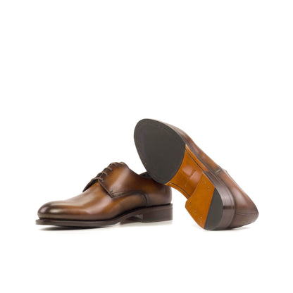 Derby in Medium Brown Painted Box Calf showing cognac leather and rubber combination sole