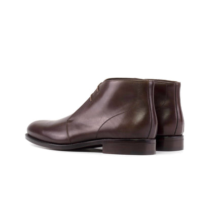 Dark brown box calf Chukka boots, rear three-quarter view