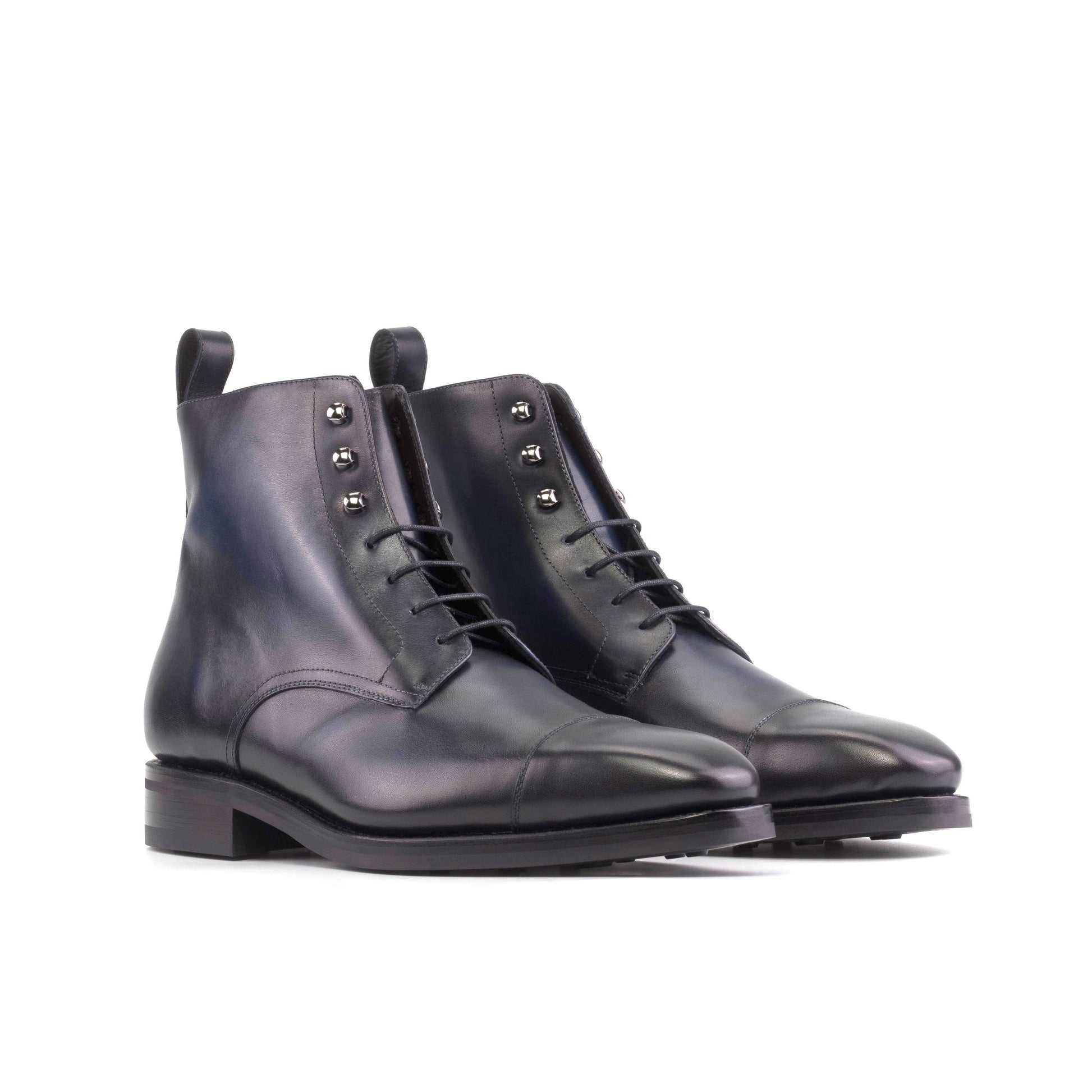 Jumper Boot in Burnished Navy Box Calf, front three-quarter view