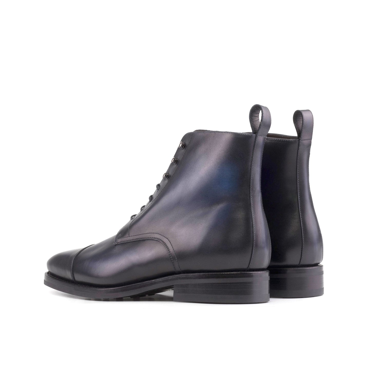 Jumper Boot in Burnished Navy Box Calf, rear three-quarter view