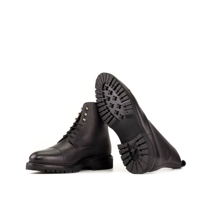 Jumper Boot in Black Painted Full-Grain Box Calf showing black commando rubber sole