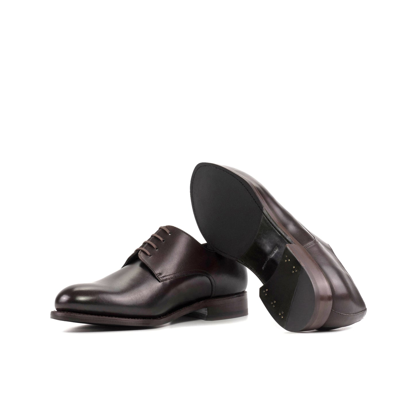 Derby in Dark Brown Painted Box Calf showing forest green leather and rubber combination sole