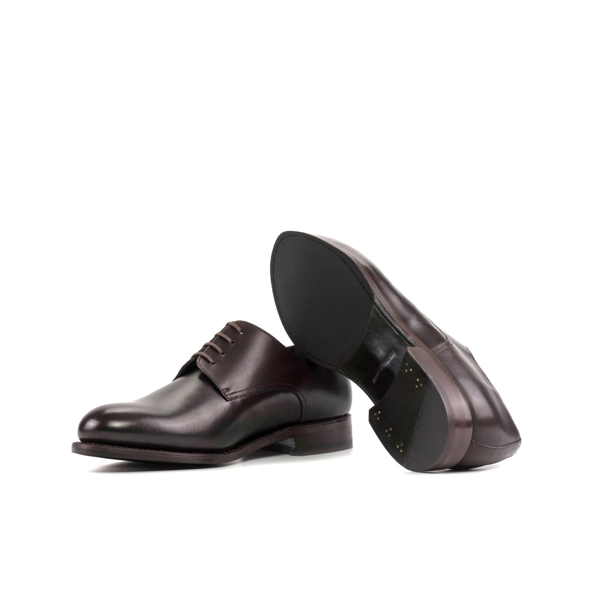 Derby in Dark Brown Painted Box Calf showing forest green leather and rubber combination sole