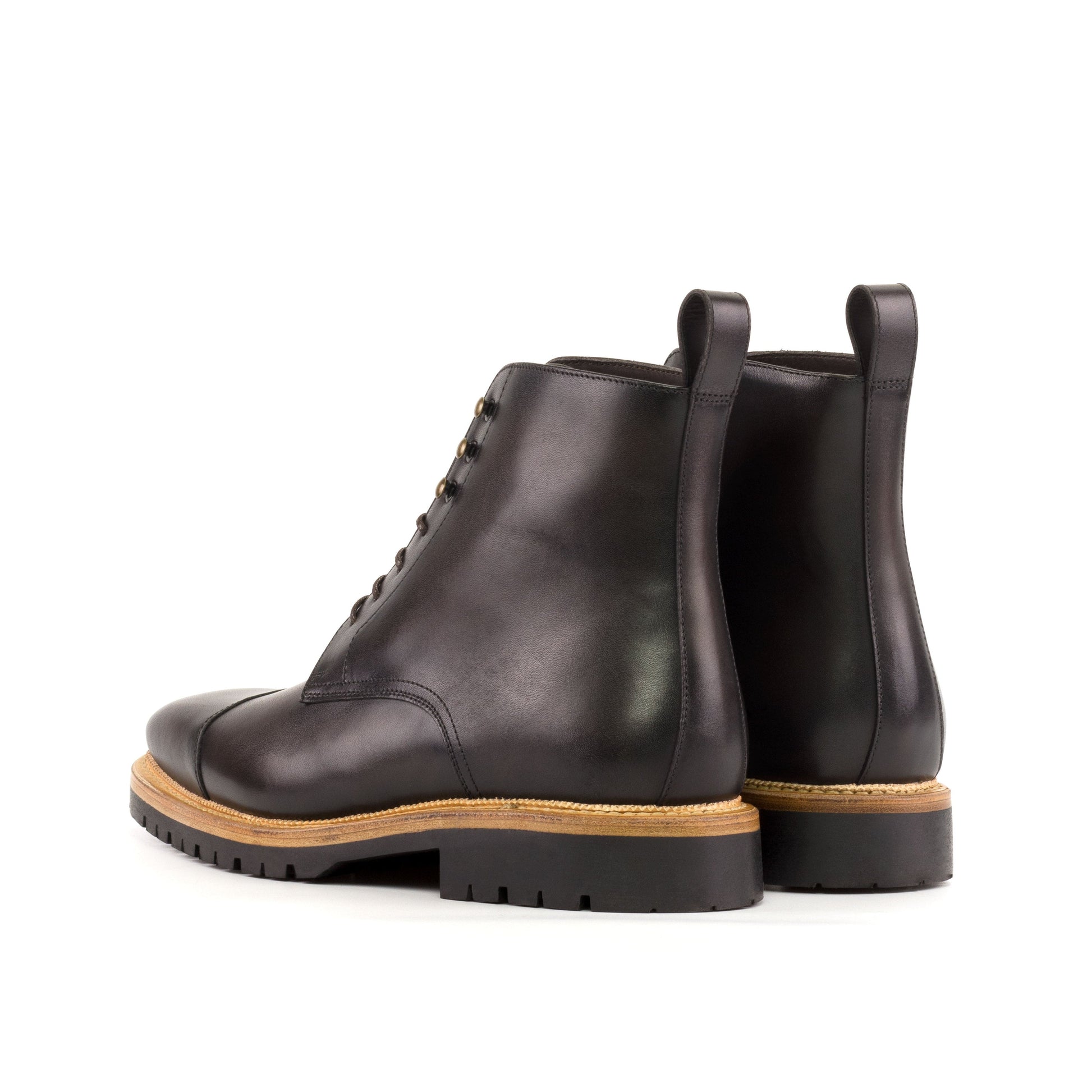 Jumper Boot in Burnished Dark Brown Painted Box Calf and Burnished Dark Brown Box Calf, rear three-quarter view