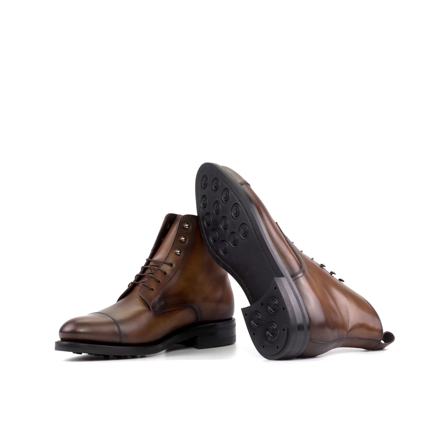 Jumper Boot in Medium Brown Painted Box Calf showing black dainite rubber sole