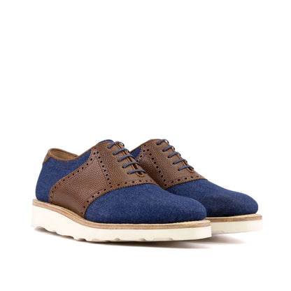 Saddle Shoe in Navy Denim and Medium Brown Painted Pebble-Grain Box Calf, front three-quarter view