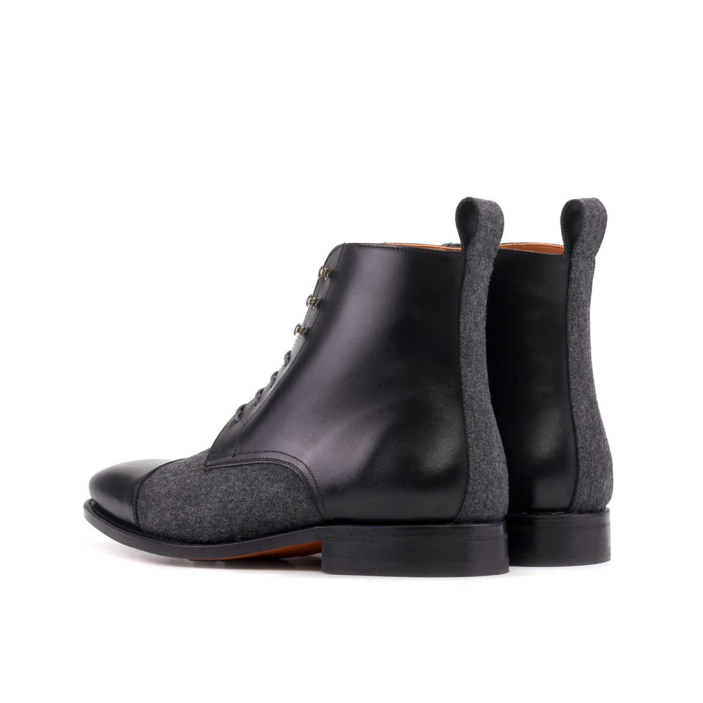 Jumper Boot in Black Painted Box Calf and Dark Grey Flannel, rear three-quarter view