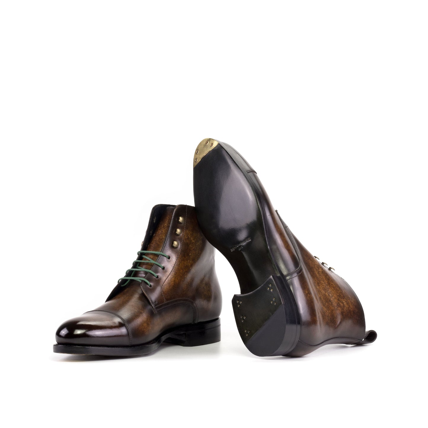 Jumper Boot in Brown Marble Patina Box Calf showing forest green leather sole with a bevelled waist