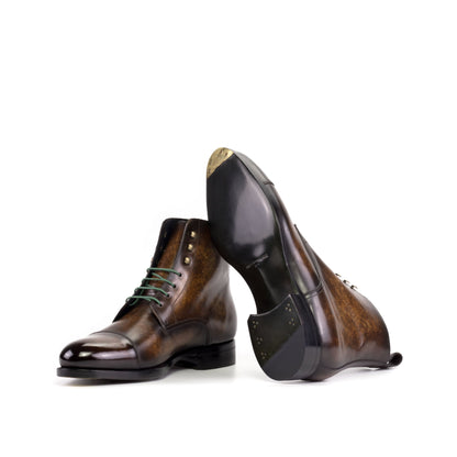 Jumper Boot in Brown Marble Patina Box Calf showing forest green leather sole with a bevelled waist