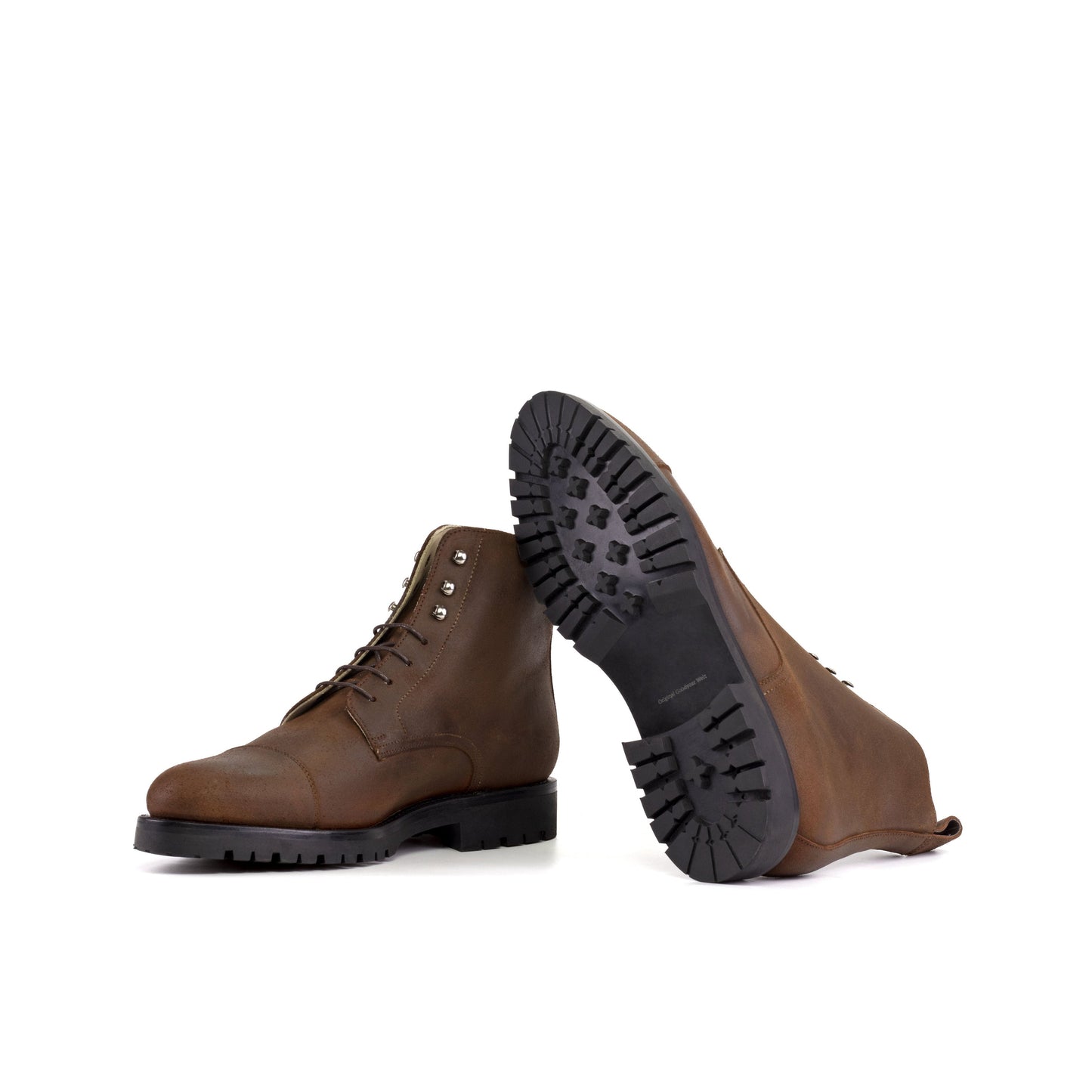 Jumper Boot in Brown Waxed Leather showing black commando rubber sole