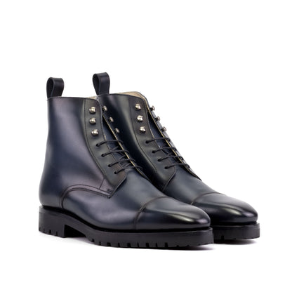 Jumper Boot in Burnished Navy Box Calf, front three-quarter view