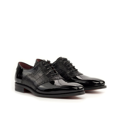Saddle Shoe in Black Patent Leather and Black Painted Croco-Embossed Box Calf, front three-quarter view